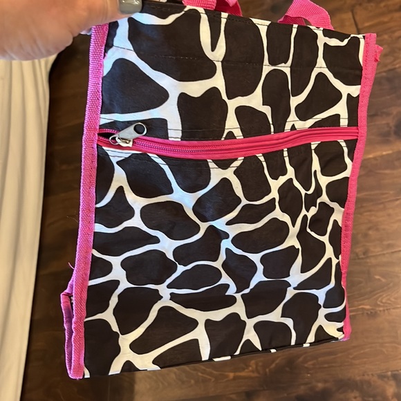 Zebra print bag. Black with pink handle and trim. Used several times. - Picture 3 of 7